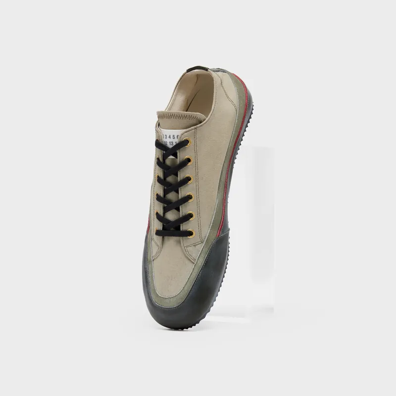 Maison Margiela 트래블러 스니커